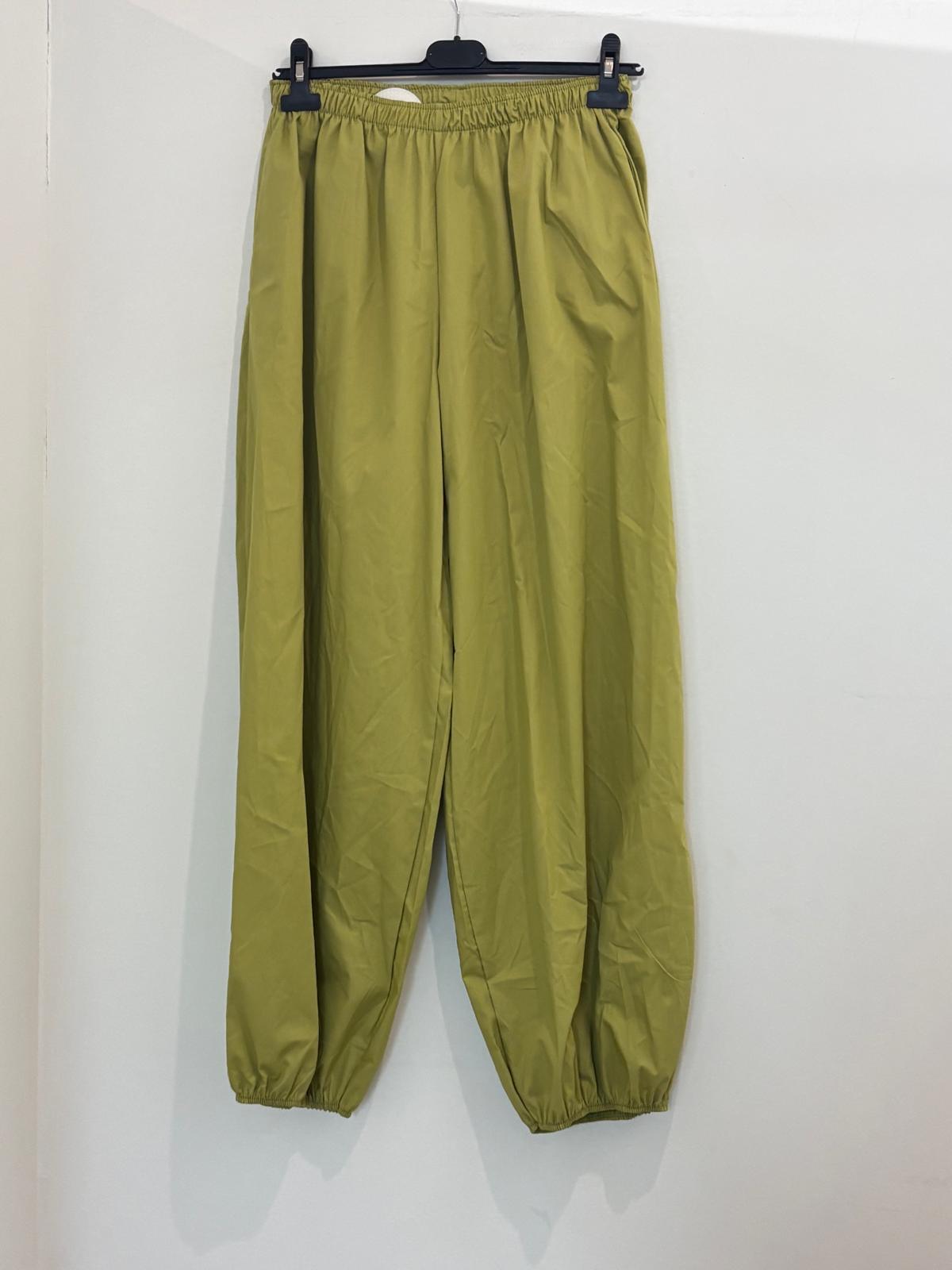 Pantalon large taille élastiquée style bouffant resserré aux chevilles