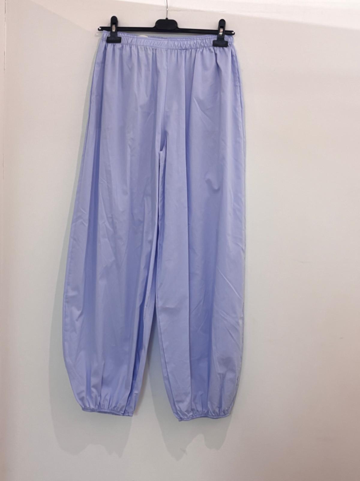 Pantalon large taille élastiquée style bouffant resserré aux chevilles