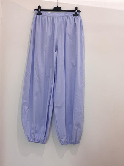 Pantalon large taille élastiquée style bouffant resserré aux chevilles