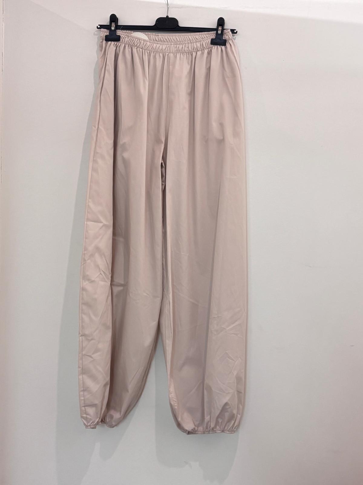 Pantalon large taille élastiquée style bouffant resserré aux chevilles