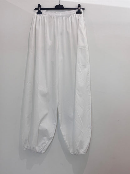 Pantalon large taille élastiquée style bouffant resserré aux chevilles