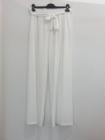 Pantalon large en tissu texturé taille élastiquée à nœud noué