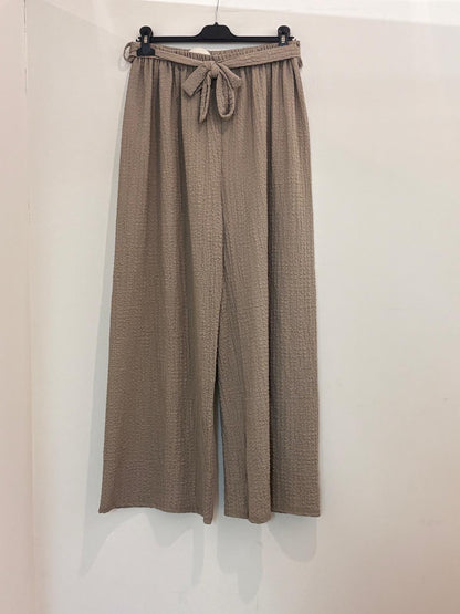 Pantalon large en tissu texturé taille élastiquée à nœud noué
