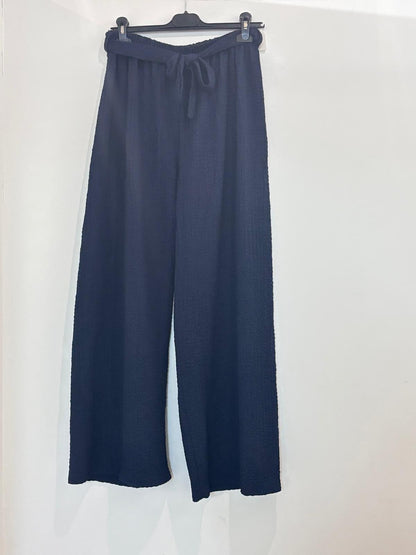Pantalon large en tissu texturé taille élastiquée à nœud noué