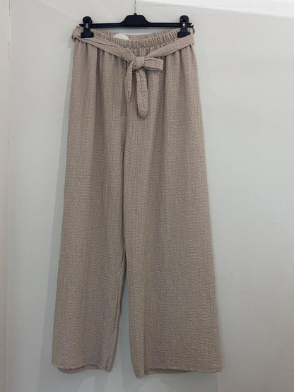 Pantalon large en tissu texturé taille élastiquée à nœud noué