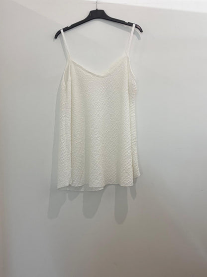 Top à fines bretelles en tissu texturé coupe ample et col en V