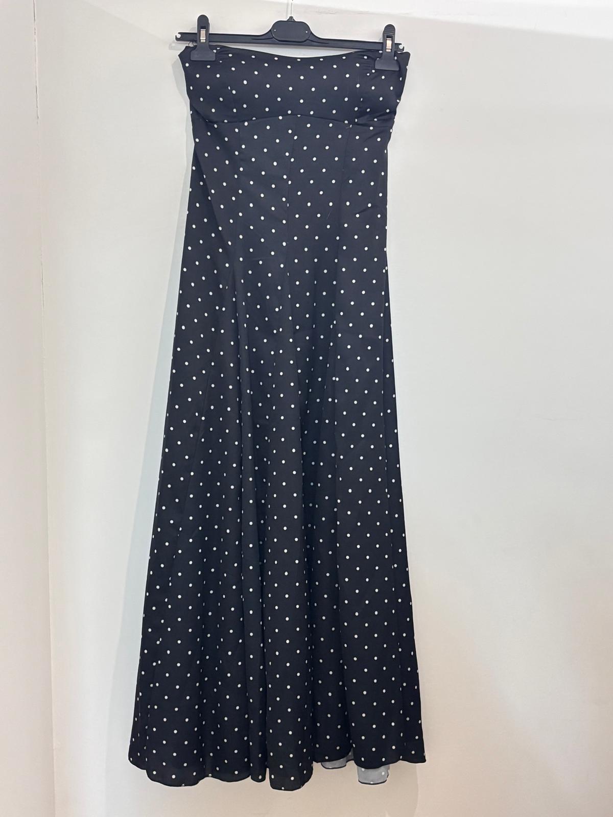 Robe à pois dos-nu à bustier corseté et jupe ample plissée