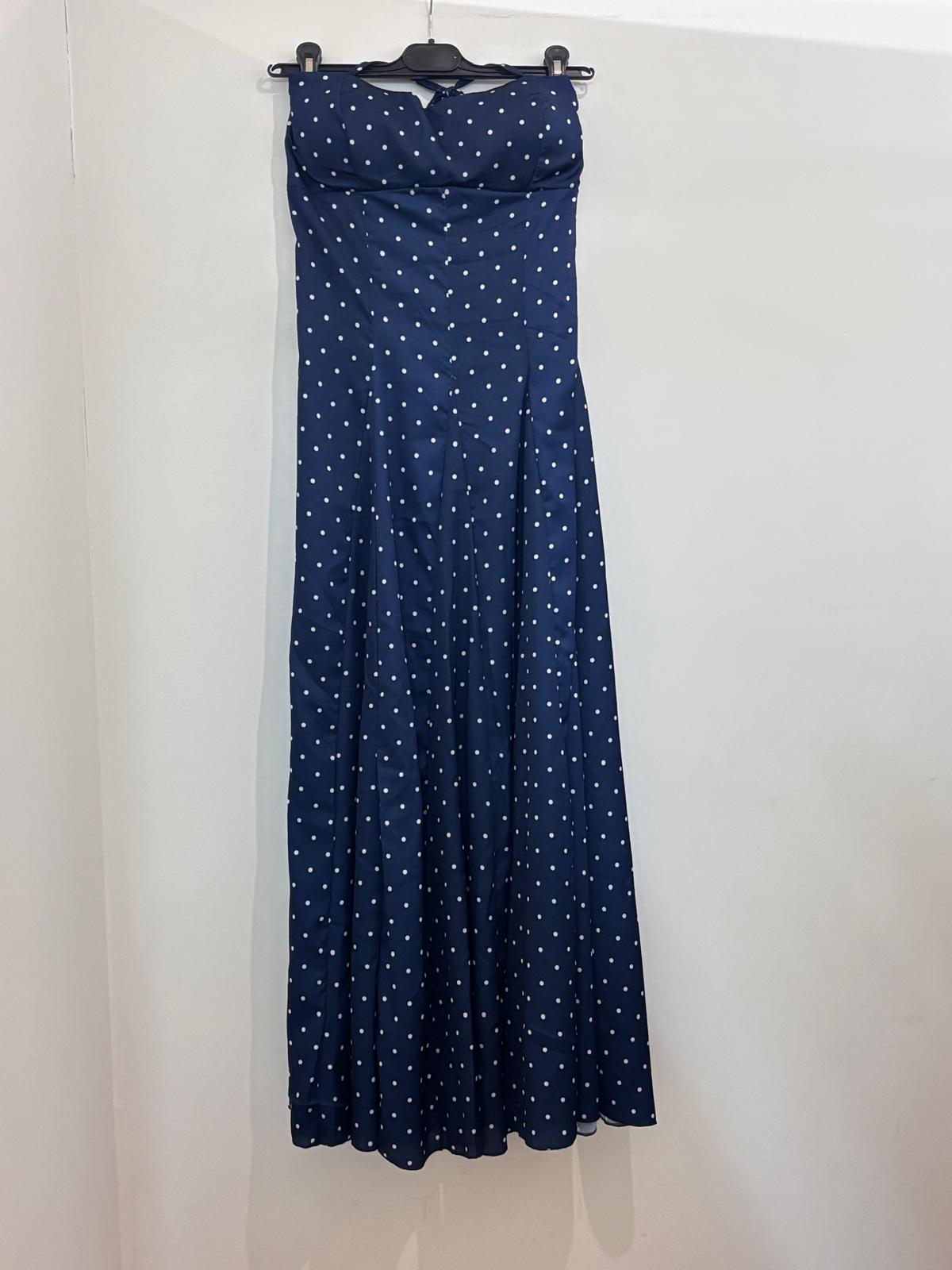 Robe à pois dos-nu à bustier corseté et jupe ample plissée
