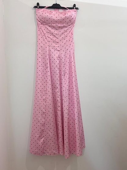Robe à pois dos-nu à bustier corseté et jupe ample plissée