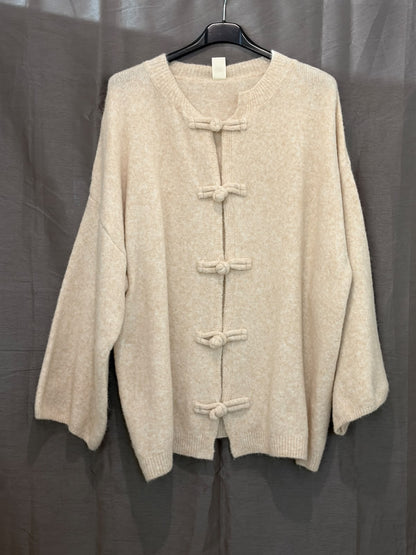 Pull style asiatique vintage et boutons traditionnels