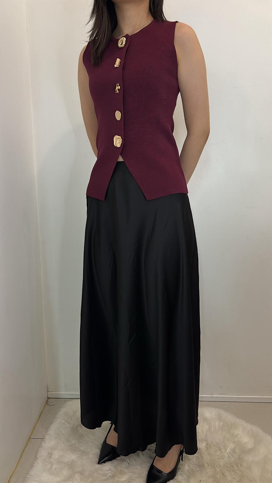 Gilet sans manches à boutons dorés