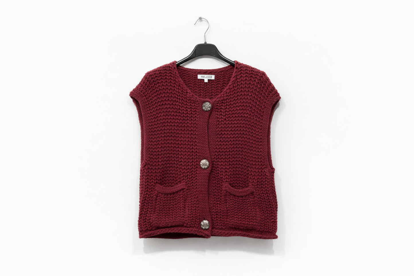 Gilet sans manches en maille texturée à boutons bijoux