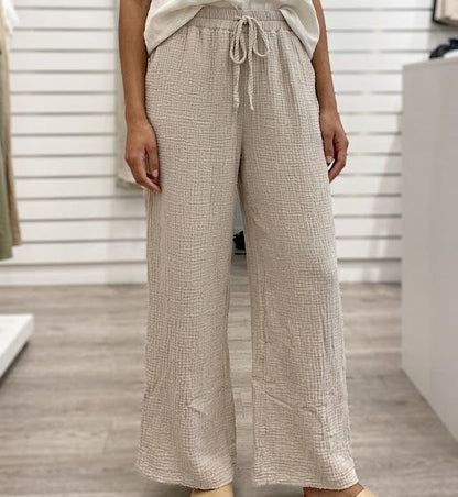 Pantalon en tissu gaze de coton texturé avec taille élastiquée et cordon