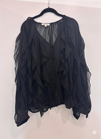 Chemise transparente à volants et col V