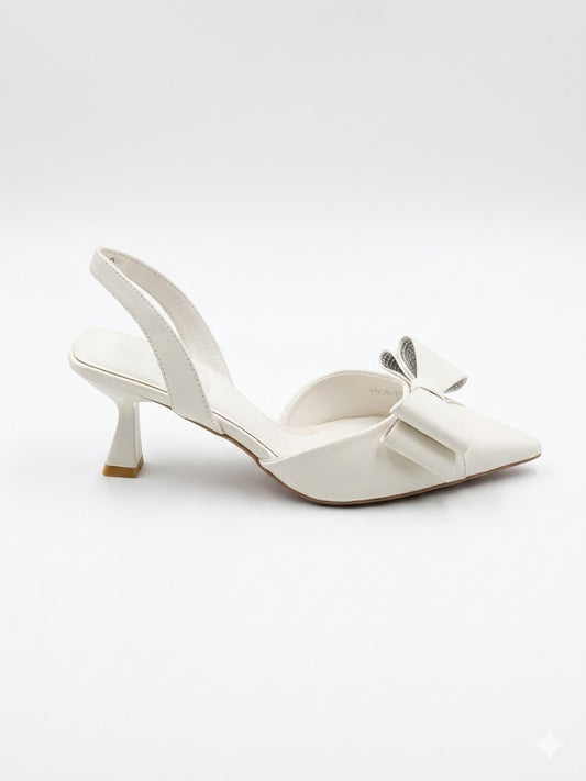 Escarpins slingback à bout pointu avec nœud oversize et talon géométrique