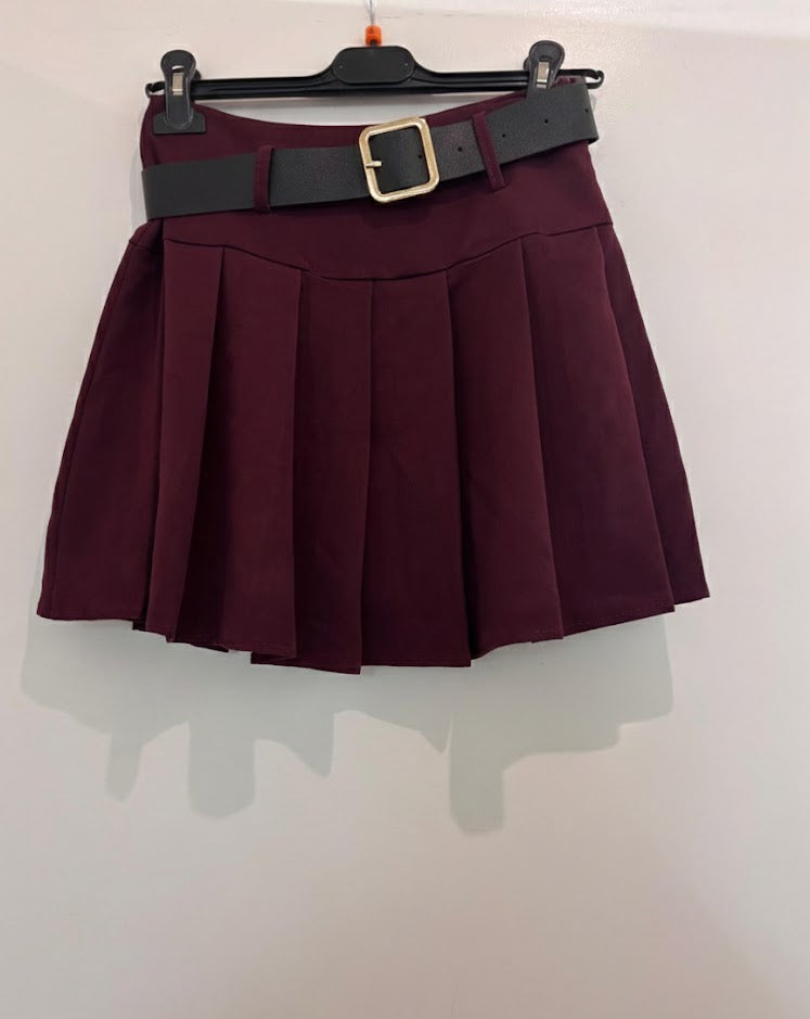 Jupe avec short intégré courte plissée avec ceinture