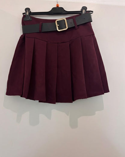Jupe avec short intégré courte plissée avec ceinture