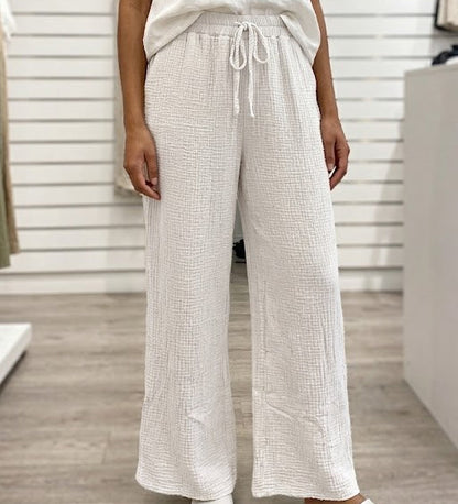 Pantalon en tissu gaze de coton texturé avec taille élastiquée et cordon